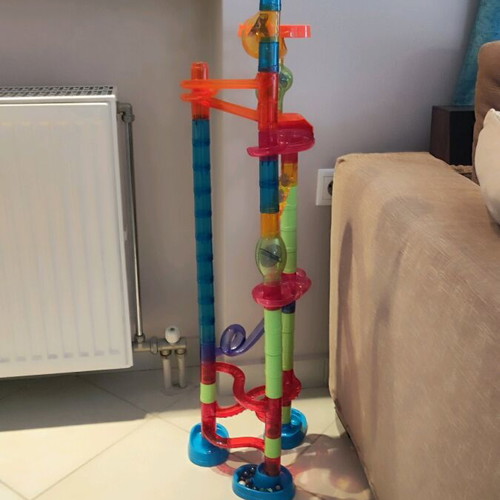 Marble run toy used, assembly game with 10 marbles