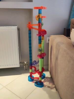 Marble run toy used, assembly game with 10 marbles
