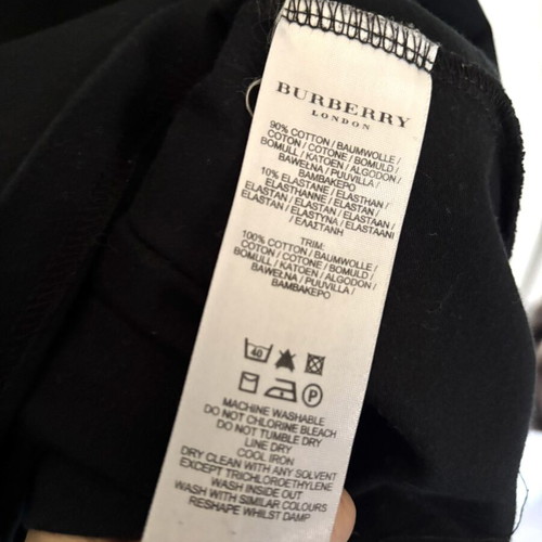 Burberry women's long sleeve top with elbow pattern, black and beige