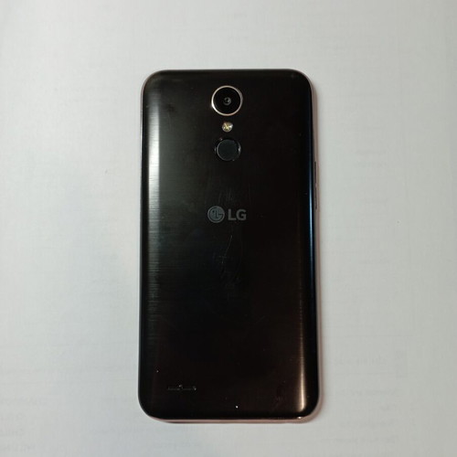 LG K10 2017 smartphone used with case and screen protector