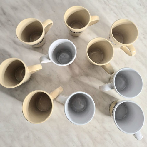 Set of 10 new mugs in box