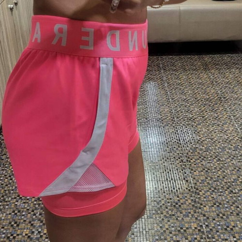 Under Armour pink shorts like new, size XS