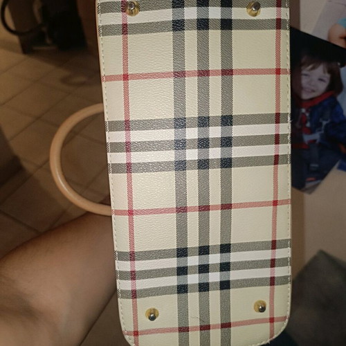 Handheld bag checkered in very good condition