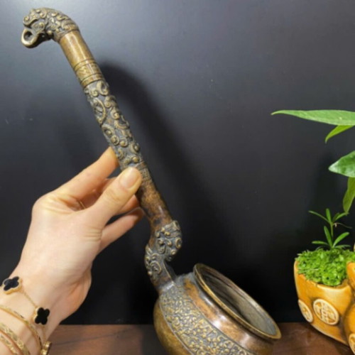 Antique Vietnamese bronze vessel used with dragon and floral design
