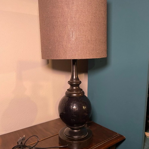 Black table lamp with glass base and gray-black shade