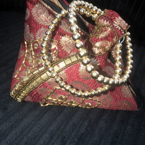 Red gold Indian brocade potli bag like new with bracelet gift