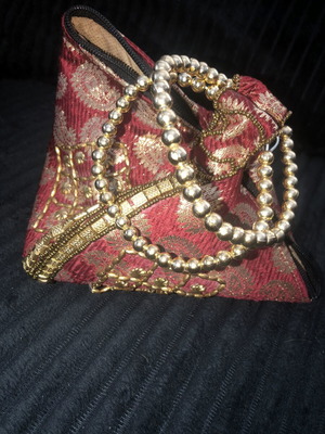 Red gold Indian brocade potli bag like new with bracelet gift