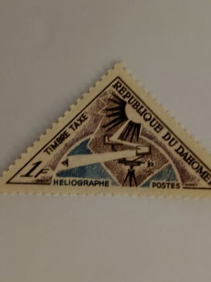 Collectible triangular Dahomey Timbre Taxe stamp 1F like new