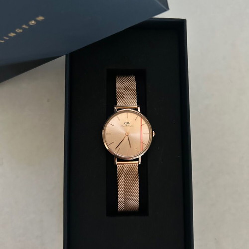 Daniel Wellington Petite Unitone watch with rose gold metal bracelet
