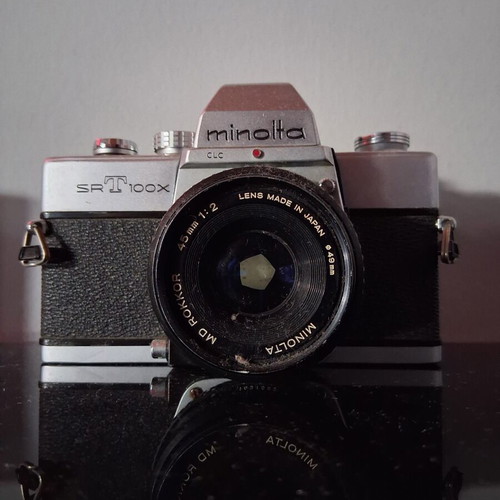 Minolta SRT 100X 35mm SLR camera used with Minolta MD Rokkor 45mm f/2 lens