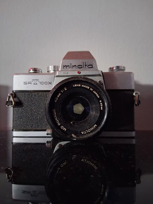 Minolta SRT 100X 35mm SLR camera used with Minolta MD Rokkor 45mm f/2 lens