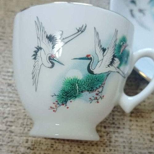 Porcelain cup set with cranes, 6 cups and 6 saucers, new
