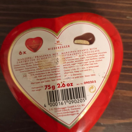 Maxim's and Niederegger used metal heart-shaped tins