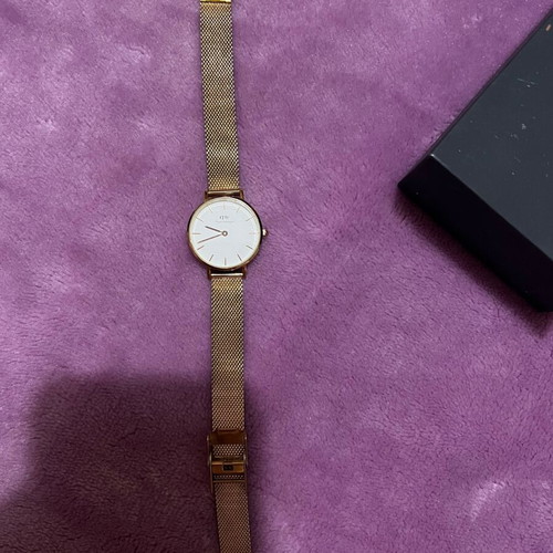 Daniel Wellington women's watch used with gold bracelet