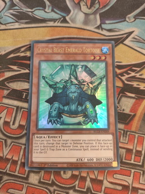 Crystal Beast Emerald Tortoise Yu-Gi-Oh card like new, ultra rare