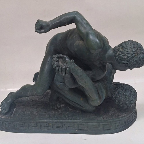Gypsum statue with ancient Greek pankration athletes used