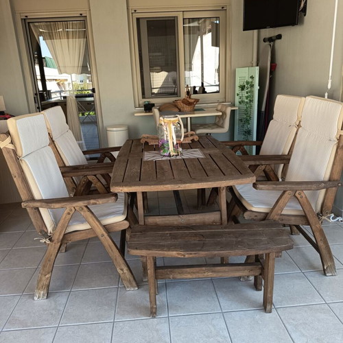 Wooden veranda dining set with folding chairs and cushions, like new