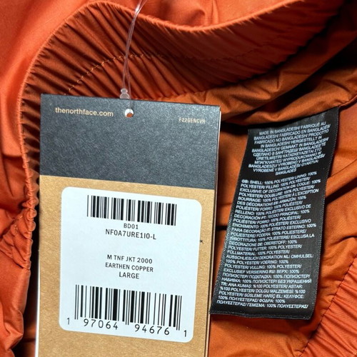 The North Face Puffer Jacket new, rust color, size L