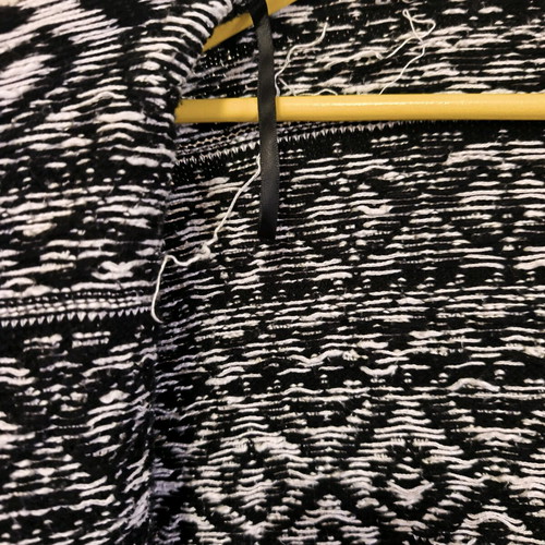 Asymmetric cardigan used with boho style, black and white
