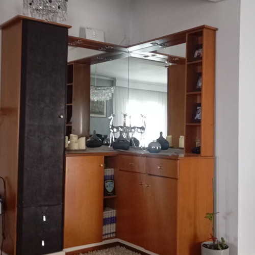 Corner reception furniture with mirror and storage, brown and faux leather