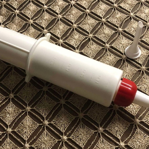 Pastry piping syringe new with 4 nozzles