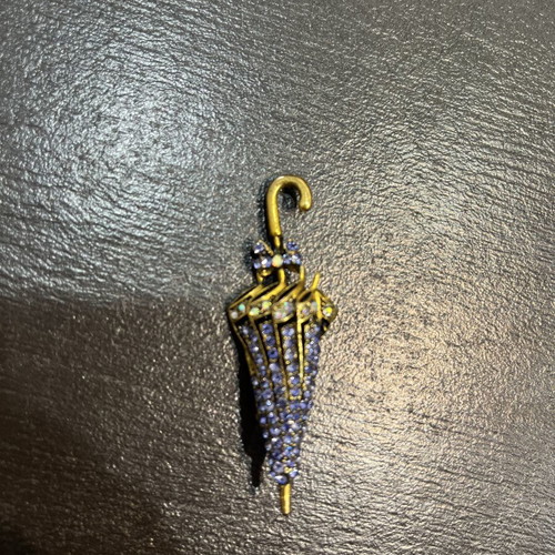 Umbrella-shaped brooch with purple crystals and antique gold metal like new