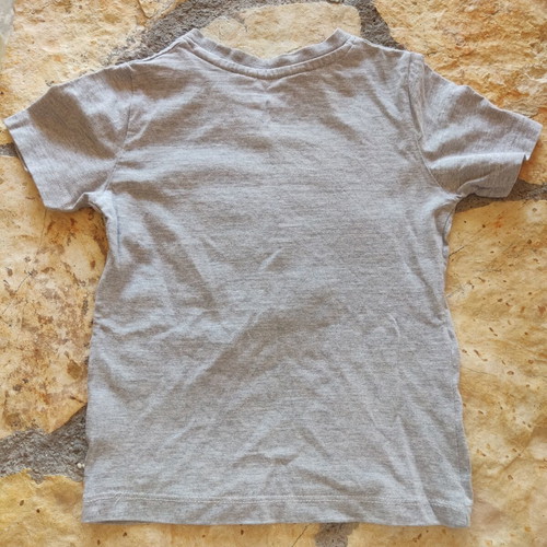 H&M T-shirt with reversible sequins, dinosaur design