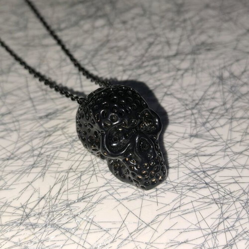 Black necklace with pendant skull like new