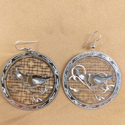 Eirinis hanging earrings new, silver with dove design