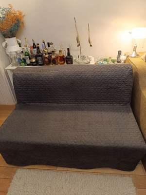 IKEA sofa bed like new with extra cover