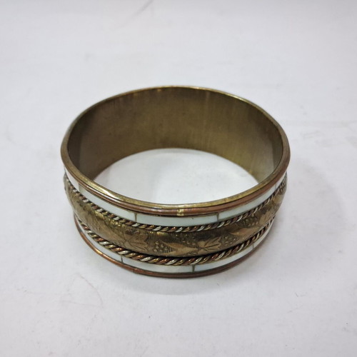 Vintage brass bracelet used with mother of pearl inlays
