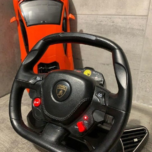 RC Lamborghini remote control car like new with steering wheel