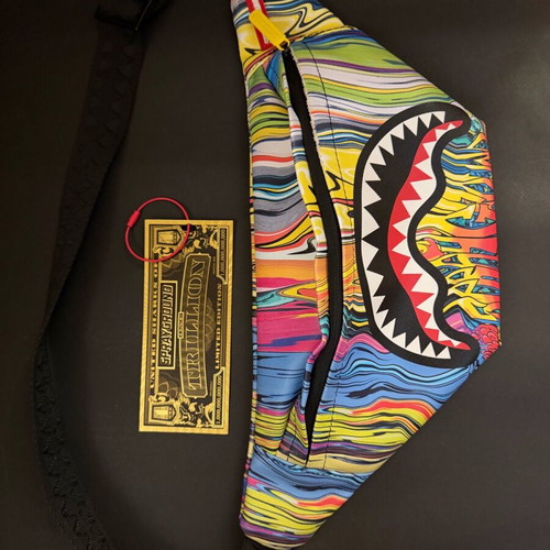 Sprayground Melt Graffiti crossbody bag like new, multicolor