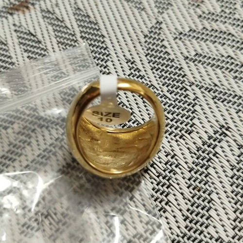 Steel women's ring No62 new, gold plated with geometric pattern