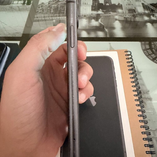 Apple iPhone 11 64GB smartphone with screen damage