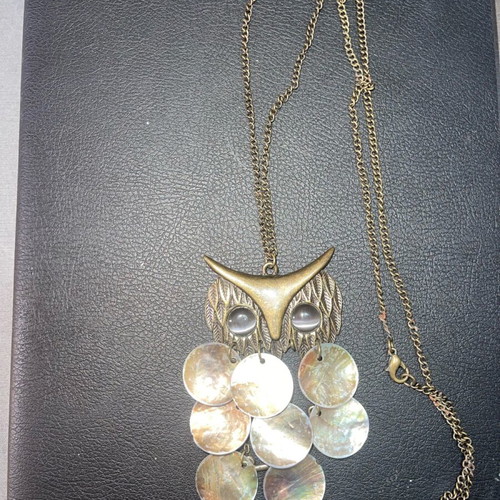 Necklace used gold color with owl design