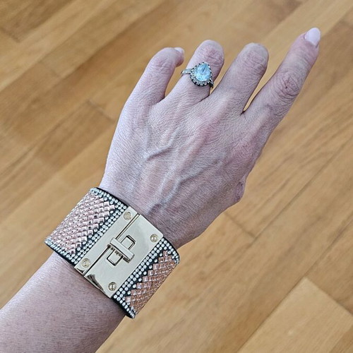 Oxette quartz watch used with bracelet and pink gold ring