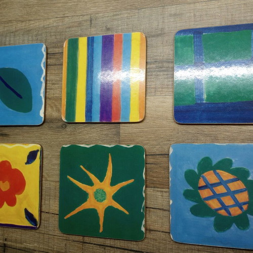 Coasters like new, set of 6 with cork base