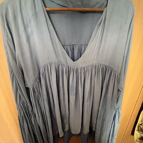 Silk baby blue blouse with puffed sleeves