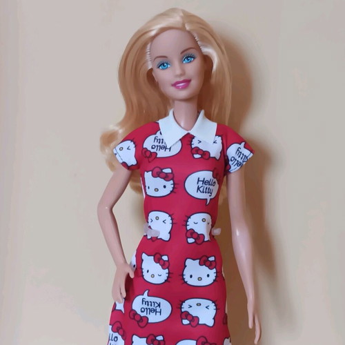 Barbie Fashion Avanue in petite body with Hello Kitty Fashion dress used