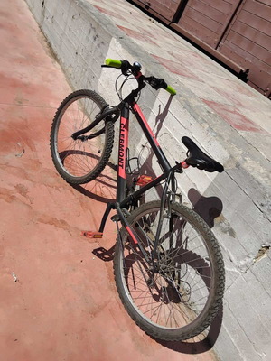 Mountain bike red, slightly used with V-Brakes