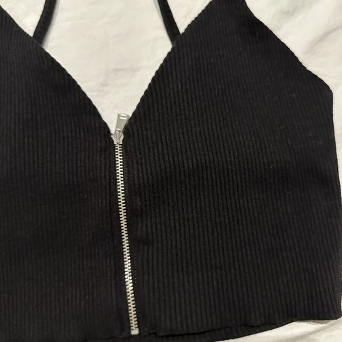 Black ribbed crop top with straps and front zipper