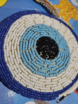 Handmade wallet with zipper, beads and eye design