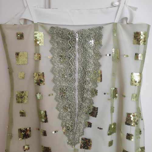 Dress green light with sequins size 48 like new