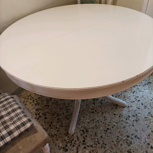 Round dining table with four chairs used, white