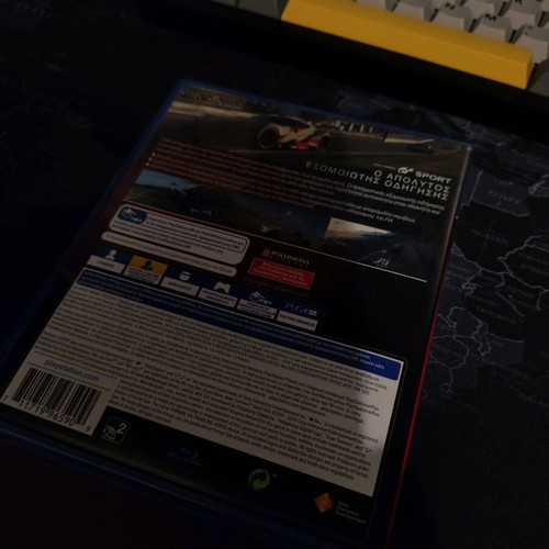 Keyboard and mouse used with Gran Turismo game