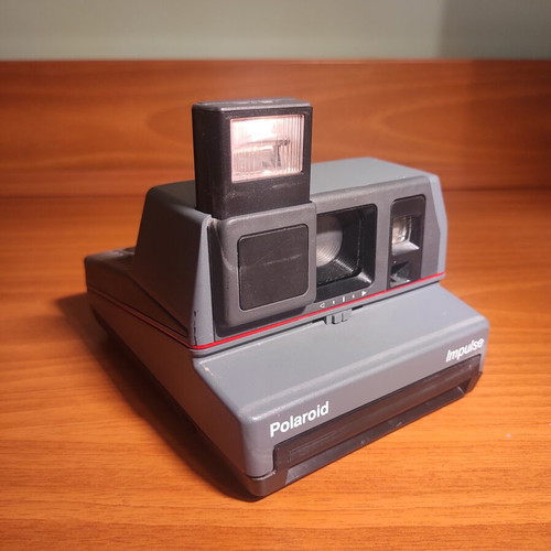 Polaroid Impulse camera used, not working, for parts