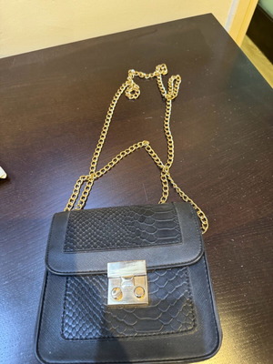 Crossbody bag like new, black with gold chain
