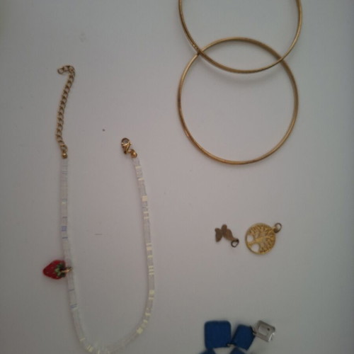 Jewelry set like new with earrings, bracelets, pendants, and anklet