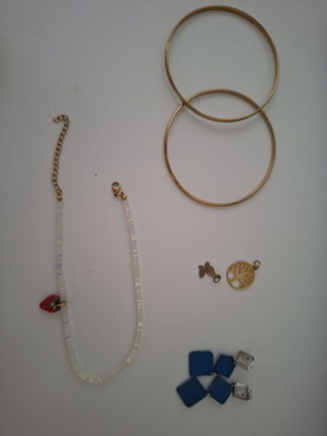 Jewelry set like new with earrings, bracelets, pendants, and anklet